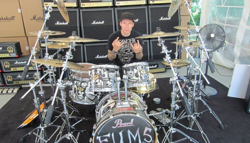 Aaron Solowoniuk behind a Pearl Drumset done by Stu Playdead